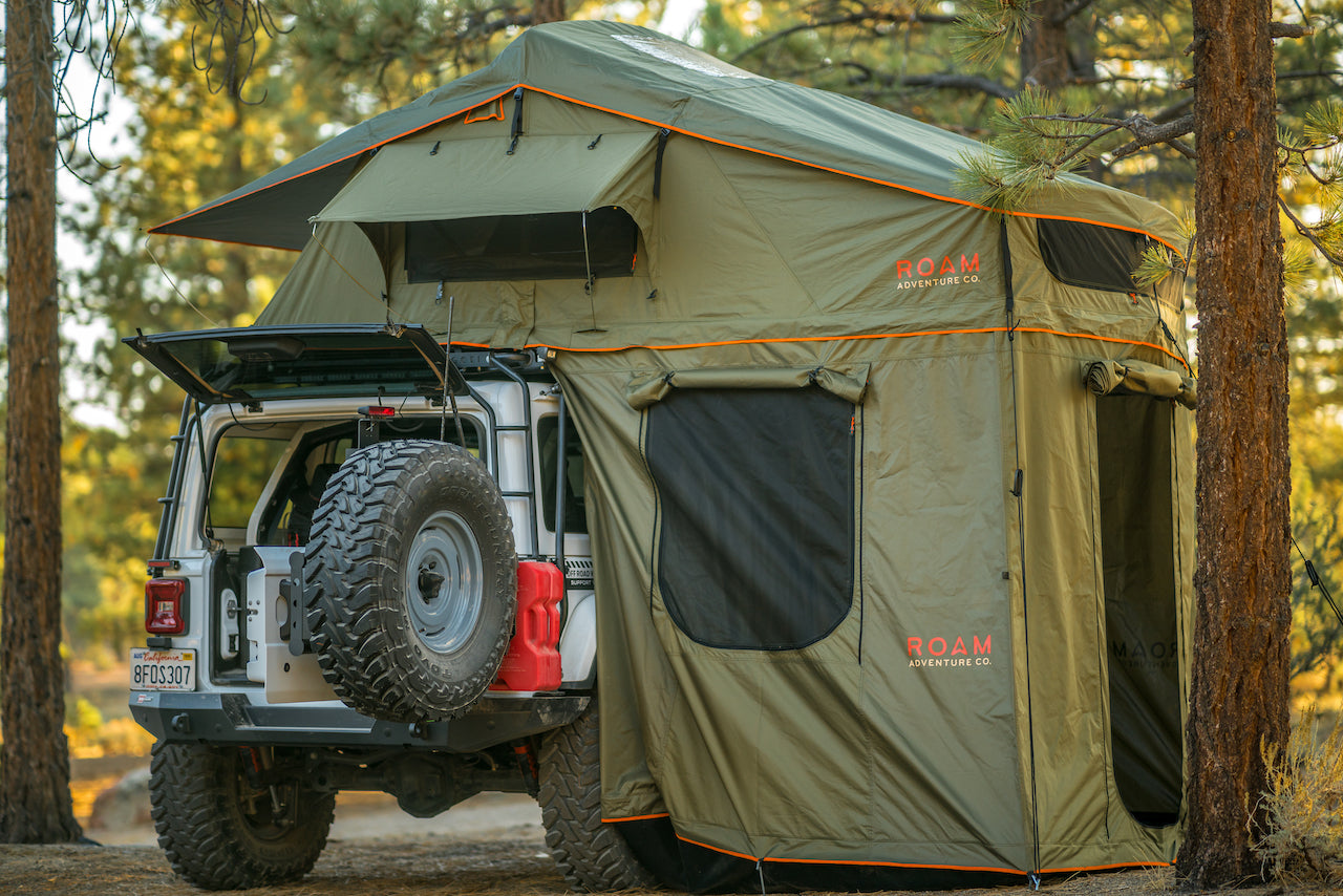 Vagabond XL Rooftop Tent on a Jeep Roubion ‚Äî showing Annex Room, rainfly, skylight windows