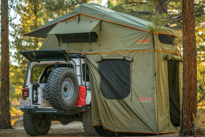 Vagabond XL Rooftop Tent on a Jeep Roubion ‚Äî showing Annex Room, rainfly, skylight windows